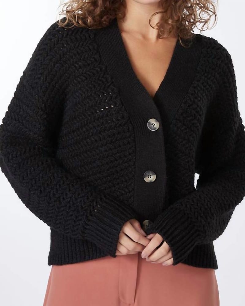 Front of a model wearing a size Large Short Zz Knit Cardigan in Black in Black by ESQUALO. | dia_product_style_image_id:334216